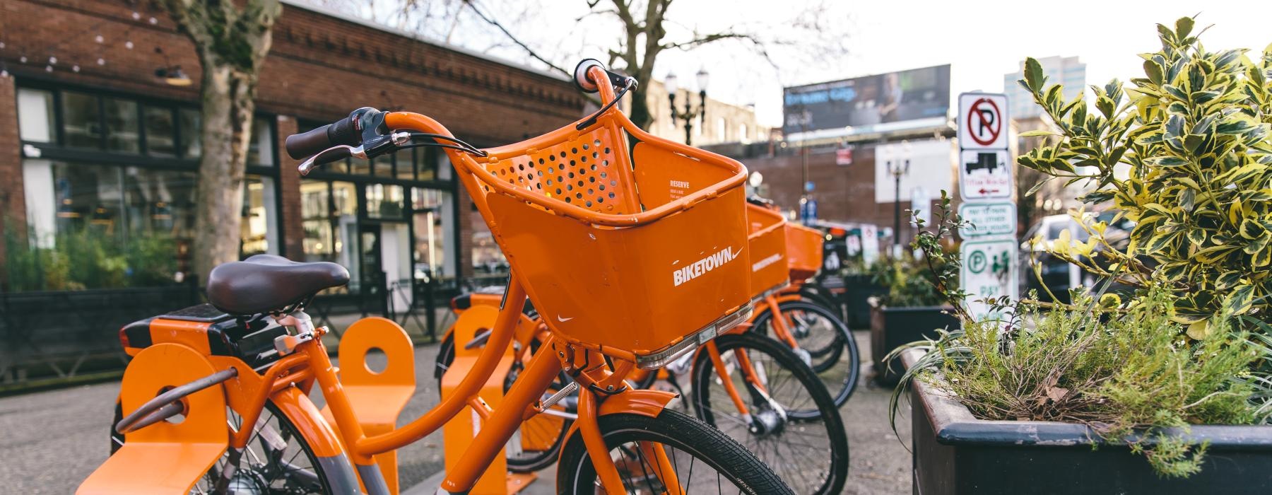a bicycle parked on a sidewalk