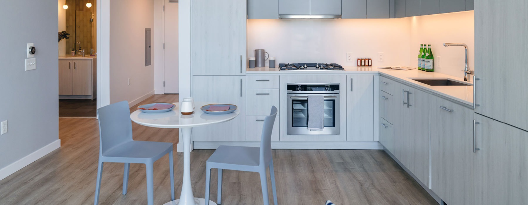 corner kitchen open to dining area