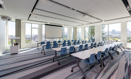 tables and chairs in conference room